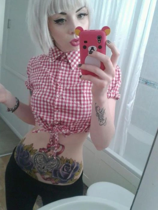 Красиві дівчата з татуюваннями (40 фото) – фото 20